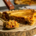 Empanada gallega de pollo y champiñones en masa horneada artesanal